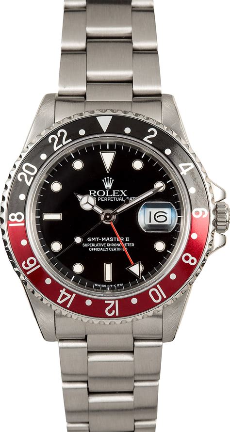 rolex gmt master black red.